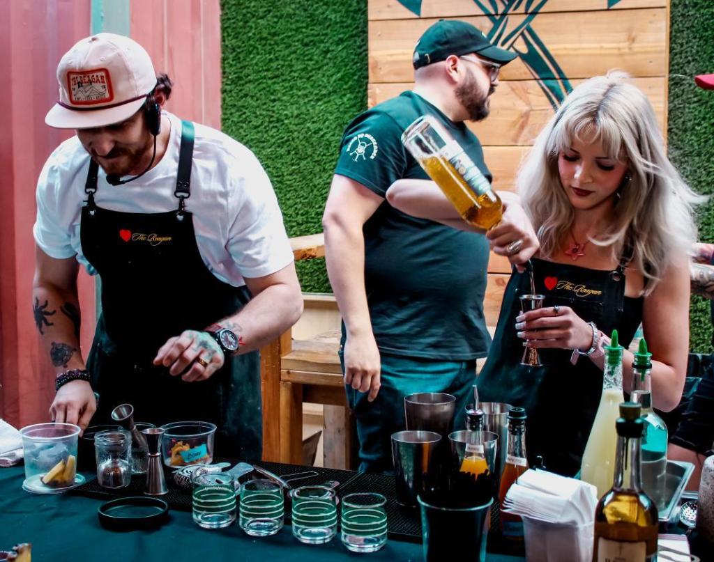 The Bishop crew preparing and presenting our signature daiquiri